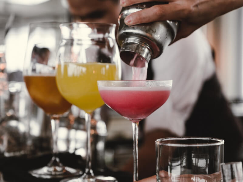 pouring drinks at a manchester cocktail class